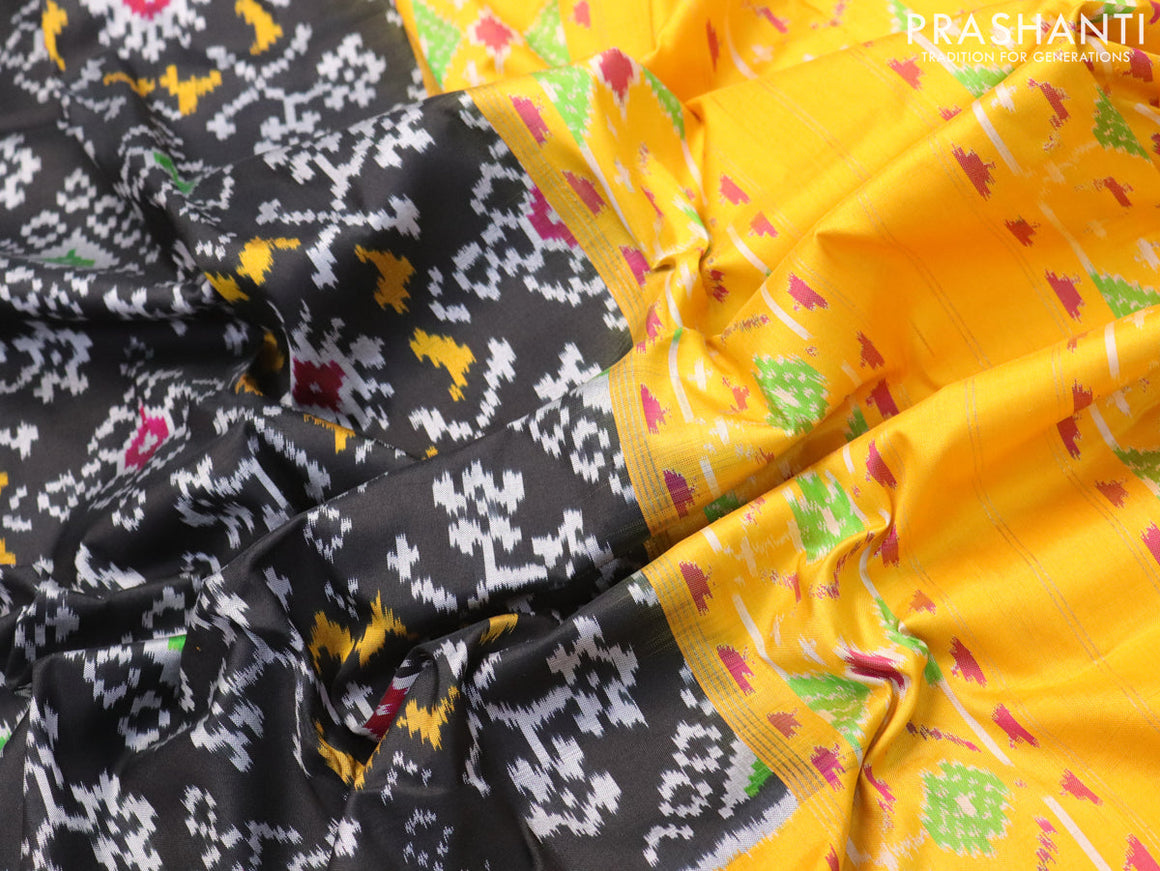 Pochampally silk saree black and mango yellow with allover ikat weaves and long zari woven border