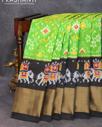 Pochampally silk saree light green and black with allover ikat weaves and zari woven border