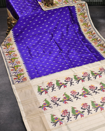 Pochampally silk saree blue and cream with allover ikat butta weaves and zari woven ikat border