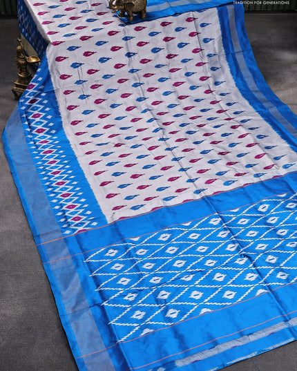 Pochampally silk saree grey and cs blue with allover ikat butta weaves and zari woven ikat border