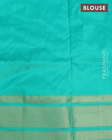 Pochampally silk saree black and teal green with allover ikat weaves and long ikat woven zari border