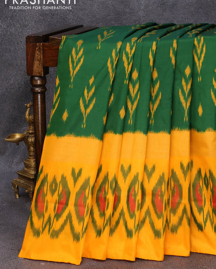 Pochampally silk saree green and mango yellow with allover ikat butta weaves and long zari woven ikat style border