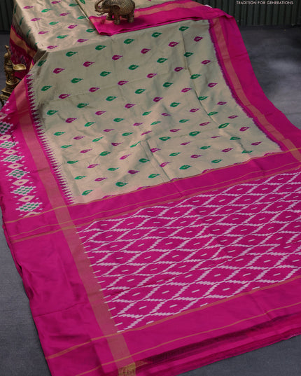 Pochampally silk saree elaichi green and pink with allover ikat butta weaves and temple design zari woven ikat style border