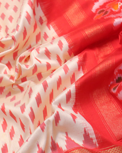 Pochampally silk saree cream and orange with allover ikat butta weaves and long ikat woven zari woven border