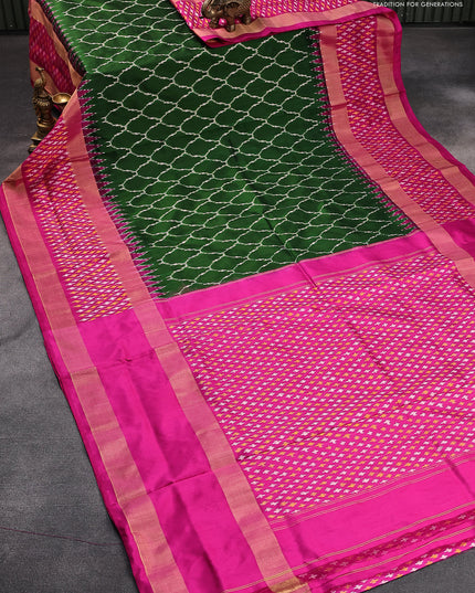 Pochampally silk saree sap green and pink with allover ikat weaves and rettapet zari woven ikat style border