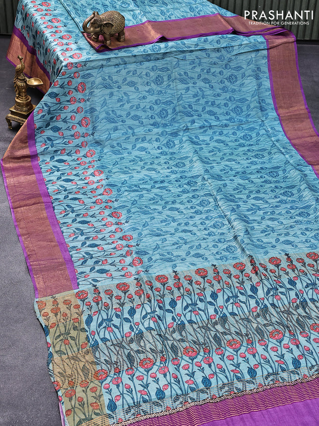 Pure tussar silk saree pastel blue and violet with allover floral prints and zari woven border