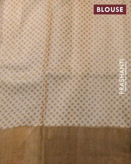 Pure tussar silk saree beige and dark sandal with allover floral prints and zari woven border