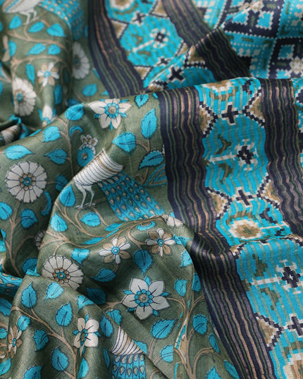 Pure tussar silk saree sap green and teal blue with allover kalamkari prints and zari woven border