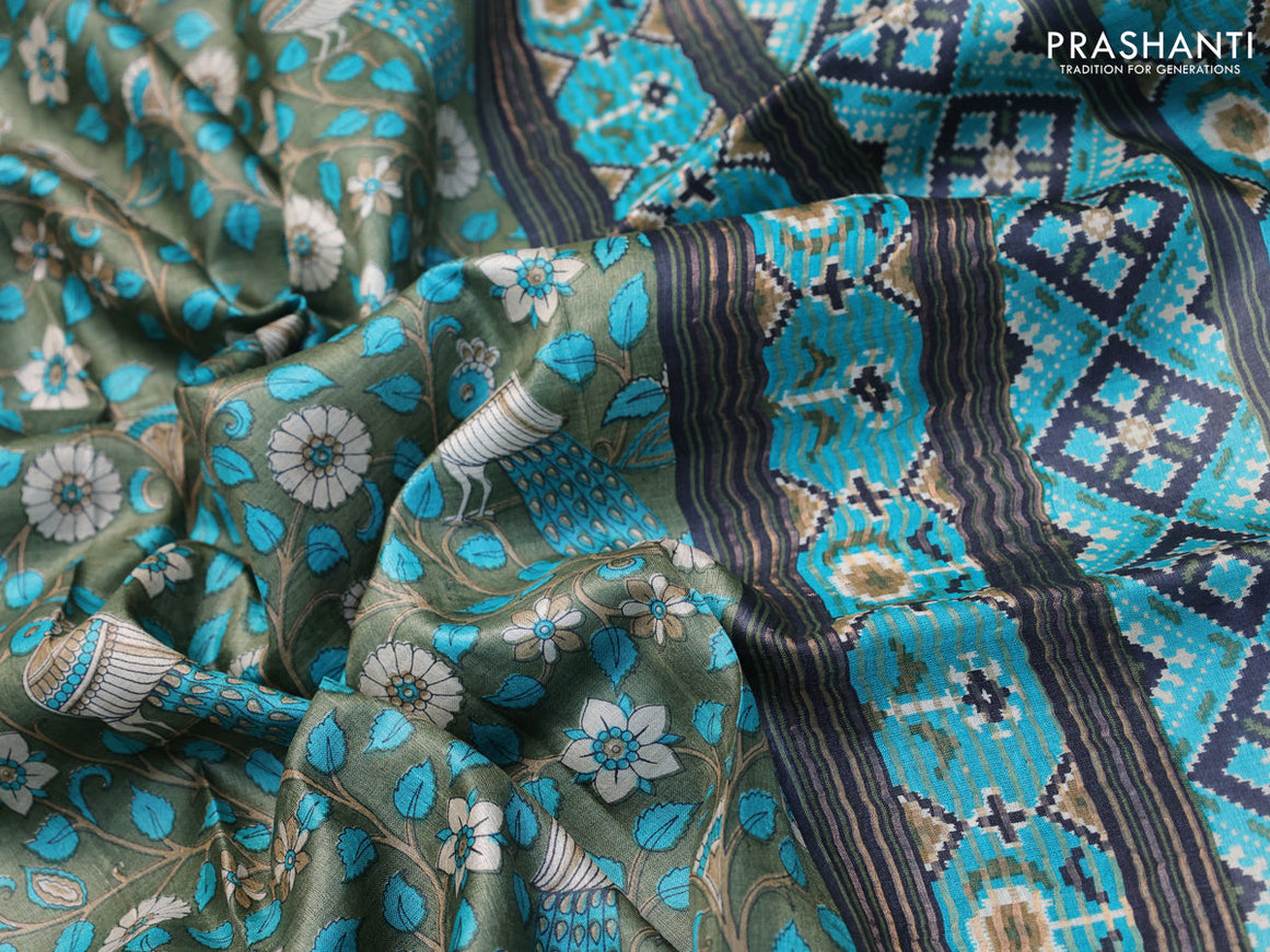 Pure tussar silk saree sap green and teal blue with allover kalamkari prints and zari woven border