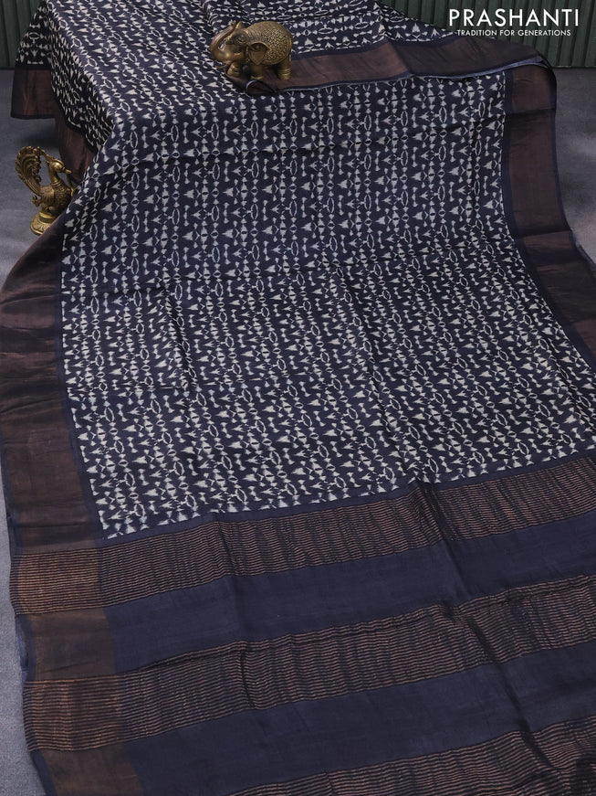 Pure tussar silk saree black with allover ikat prints and zari woven border