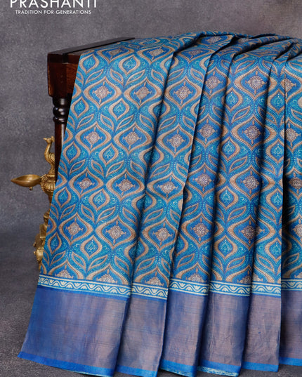 Pure tussar silk saree blue and grey shade with allover prints and zari woven border