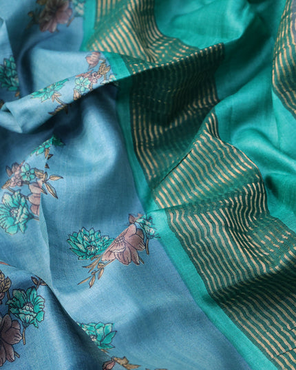 Pure tussar silk saree pastel blue and green with allover floral butta prints and zari woven border