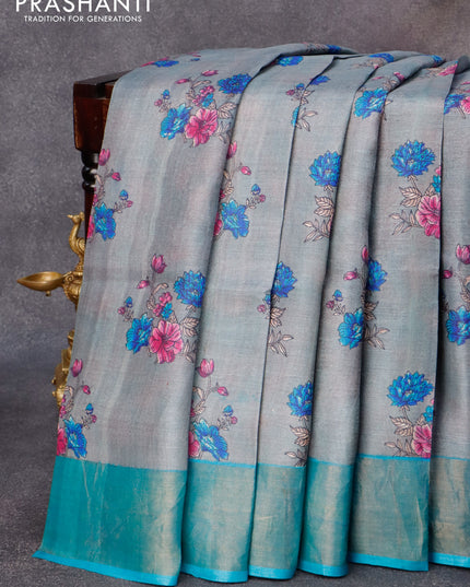 Pure tussar silk saree grey and blue with allover floral butta prints and zari woven border