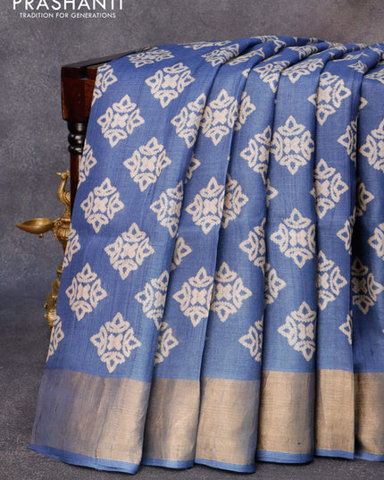 Pure tussar silk saree blue shade with allover butta prints and zari woven border