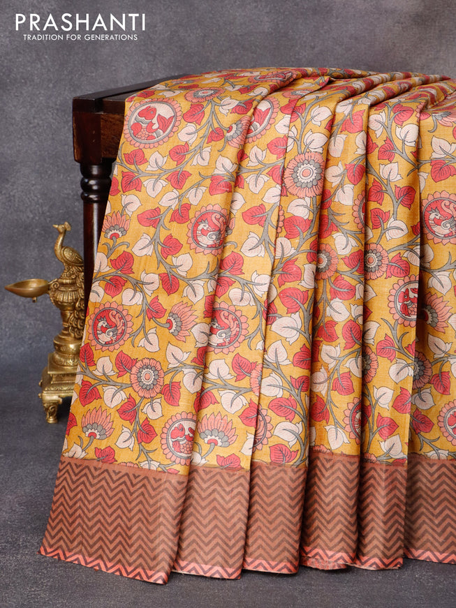 Pure tussar silk saree mustard yellow and rust shade with allover floral prints and zari woven border