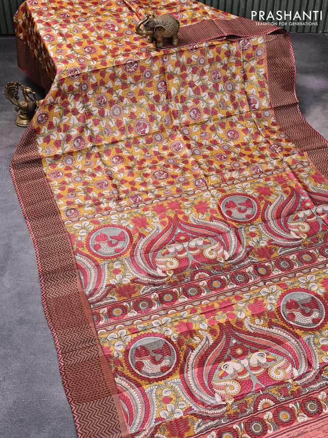 Pure tussar silk saree mustard yellow and rust shade with allover floral prints and zari woven border