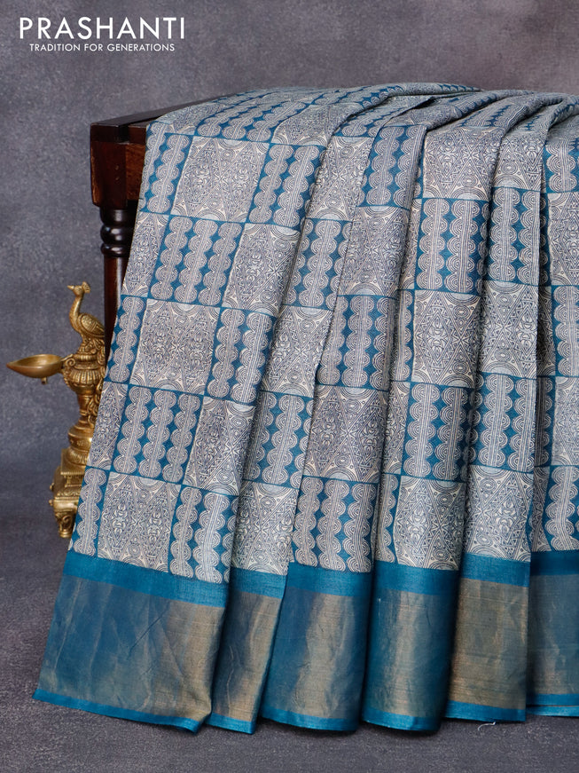 Pure tussar silk saree beige and peacock blue with allover prints and zari woven border