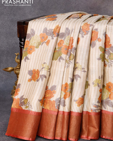 Pure tussar silk saree beige and rustic brown with allover floral butta prints and zari woven border