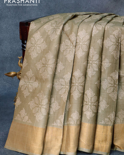 Pure tussar silk saree elaichi green with allover butta prints and zari woven border