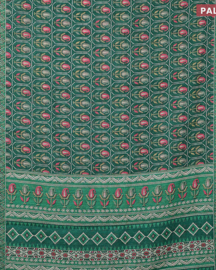 Linen cotton saree green with allover patola prints and silver zari woven border