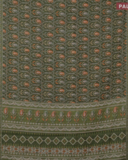 Linen cotton saree sap green with allover patola prints and silver zari woven border
