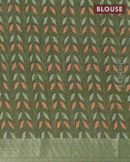 Linen cotton saree sap green with allover patola prints and silver zari woven border