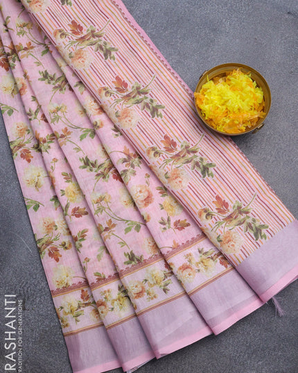 Linen cotton saree light pink with allover floral prints and silver zari woven border