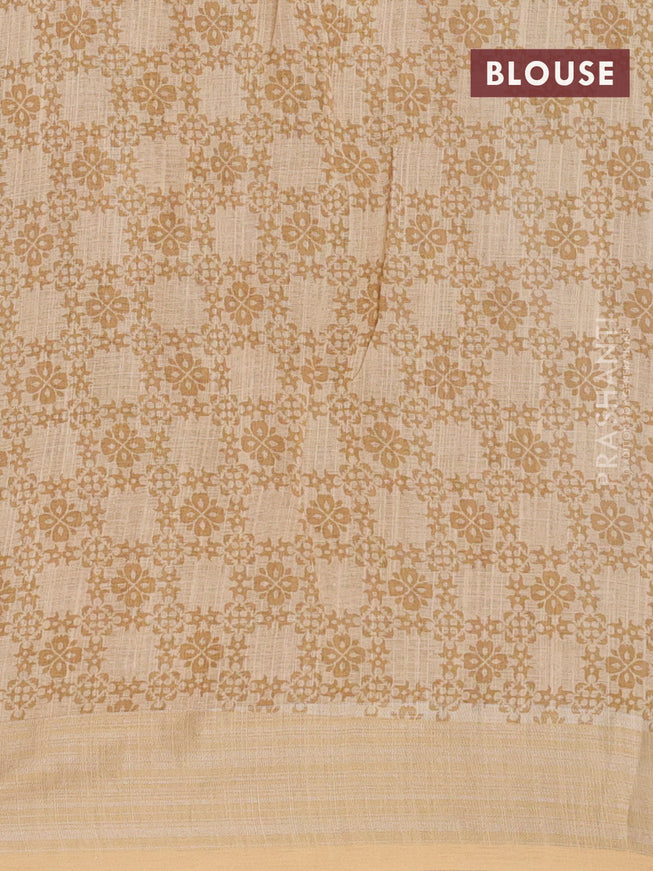 Linen cotton saree beige with allover floral prints and silver zari woven border