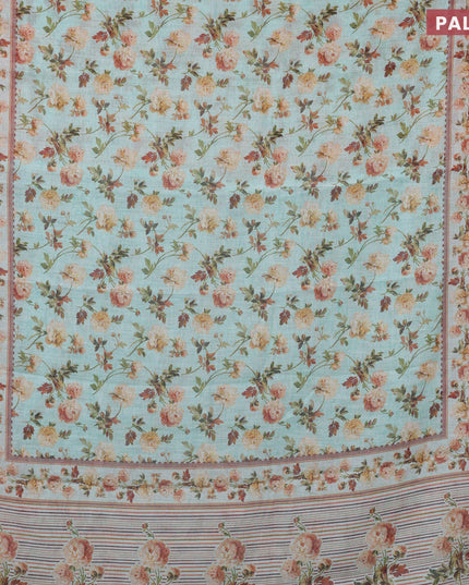 Linen cotton saree teal blue shade with allover floral prints and silver zari woven border