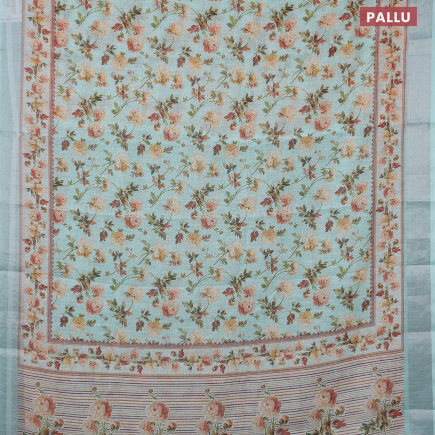 Linen cotton saree teal blue shade with allover floral prints and silver zari woven border
