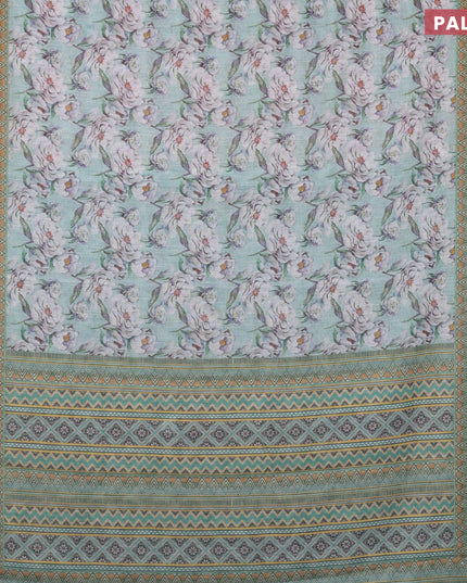 Linen cotton saree teal green shade with allover floral prints and silver zari woven border