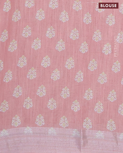 Linen cotton saree pastel pink shade with allover floral prints and silver zari woven border