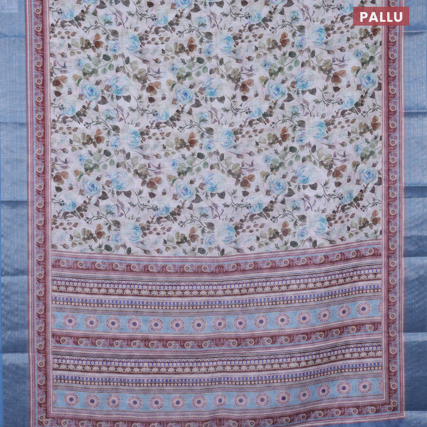 Linen cotton saree off white and blue with allover floral prints and silver zari woven border