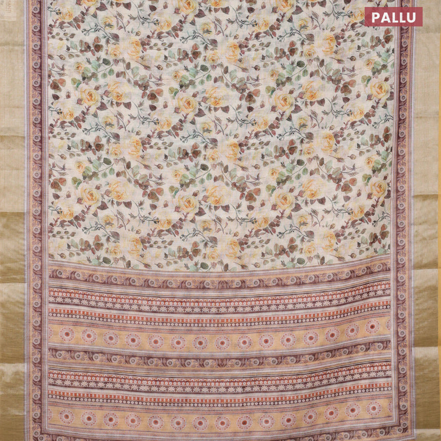 Linen cotton saree cream and mustard shade with allover floral prints and silver zari woven border