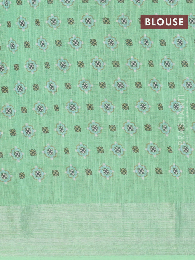 Linen cotton saree pista green and green with allover floral prints and silver zari woven border