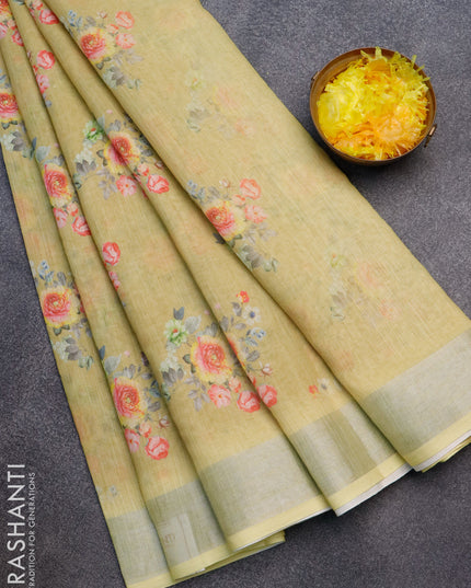 Linen cotton saree lime yellow with floral butta prints and silver zari woven border