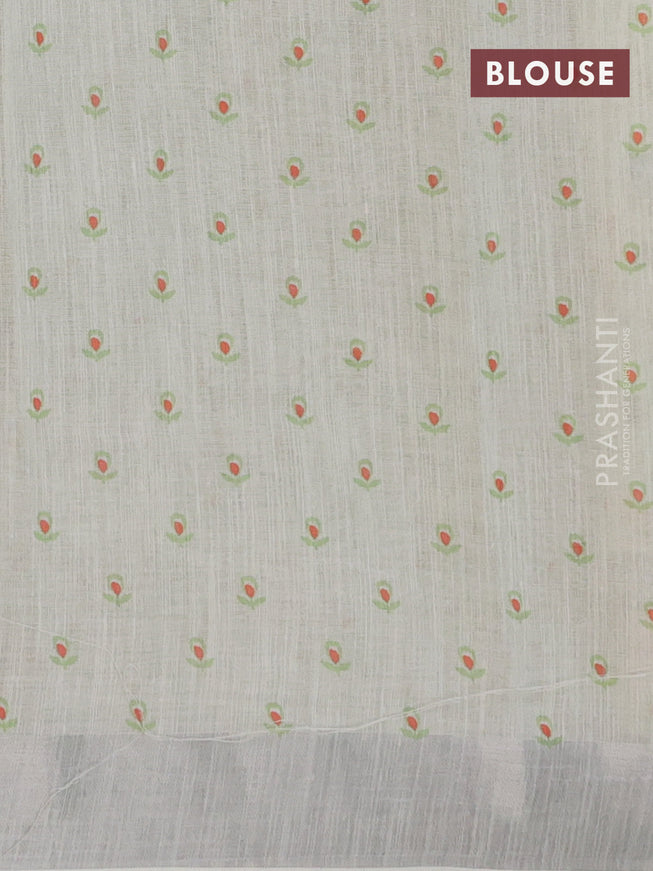 Linen cotton saree mild pista green with allover floral prints and silver zari woven border