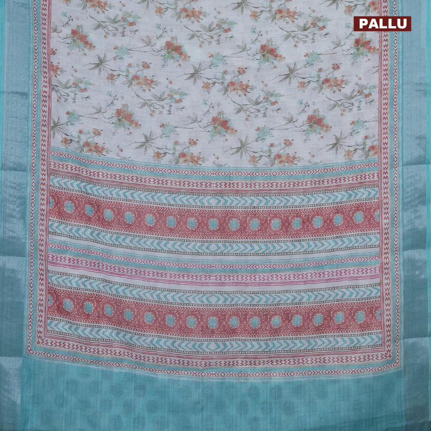 Linen cotton saree off white and teal blue with allover floral prints and silver zari woven border