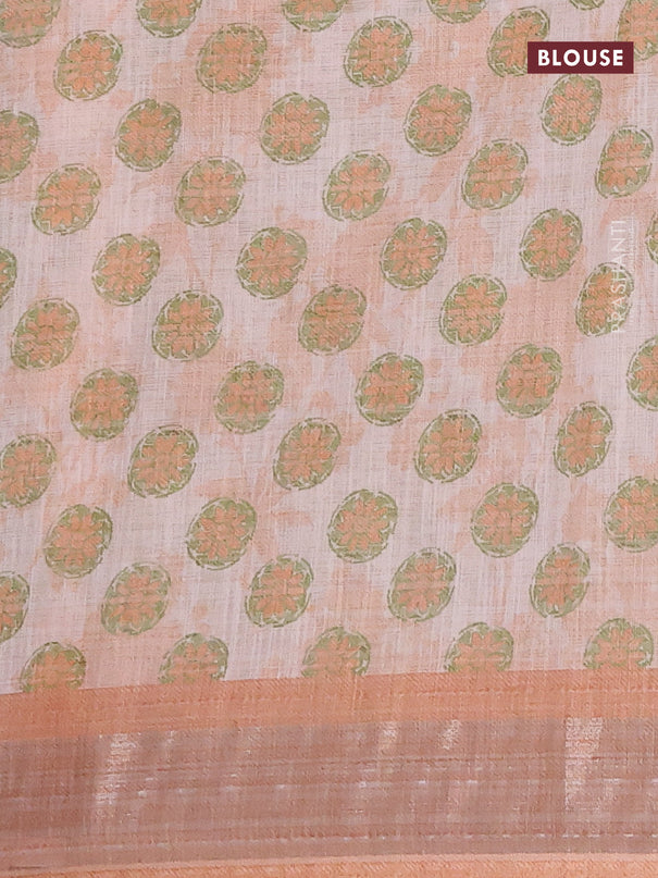 Linen cotton saree mild peach orange with allover floral prints and silver zari woven border