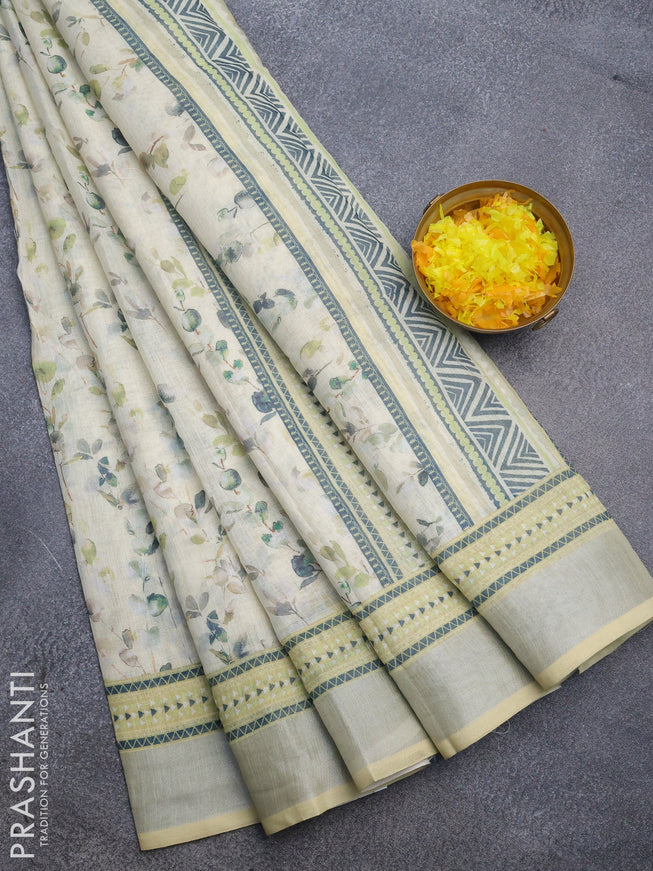 Linen cotton saree pale yellow with allover weaves and silver zari woven border