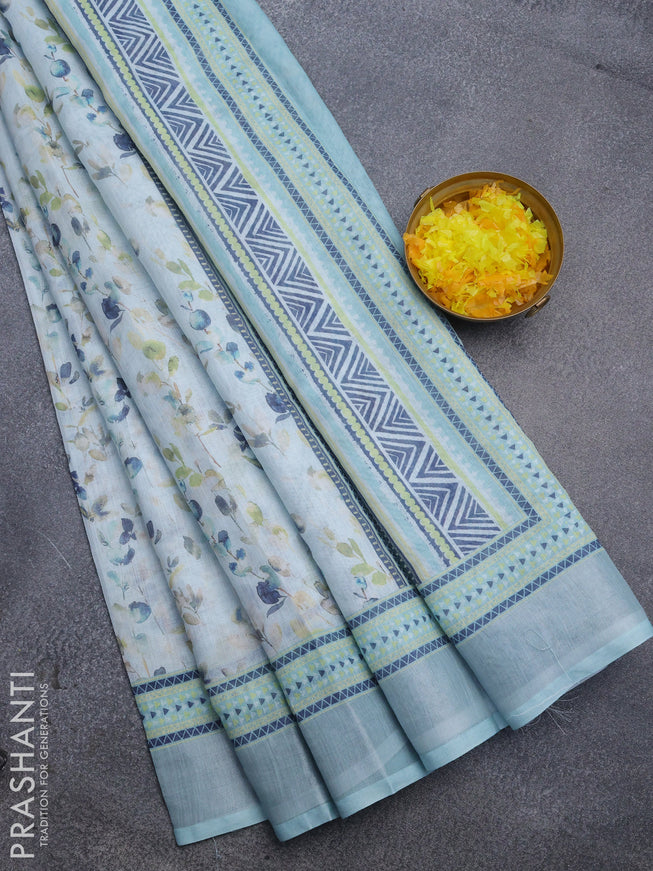 Linen cotton saree teal blue shade with allover weaves and silver zari woven border