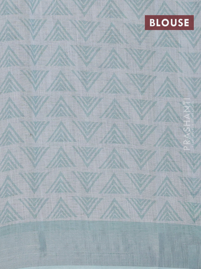 Linen cotton saree teal blue shade with allover weaves and silver zari woven border