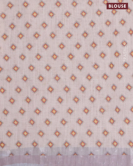 Linen cotton saree mild peach with allover weaves and silver zari woven border