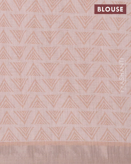 Linen cotton saree mild peach orange with allover weaves and silver zari woven border