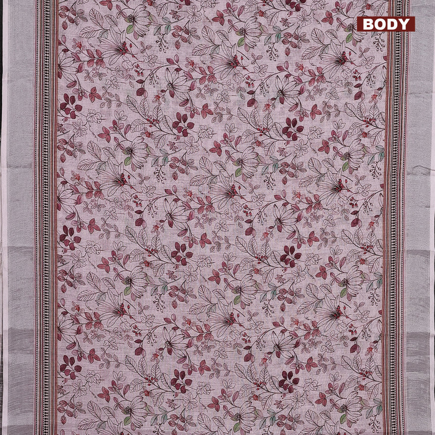 Linen cotton saree baby pink with allover floral prints and silver zari woven border