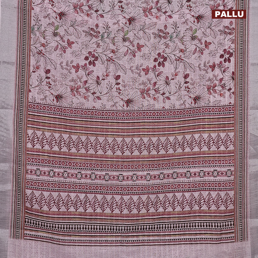 Linen cotton saree baby pink with allover floral prints and silver zari woven border