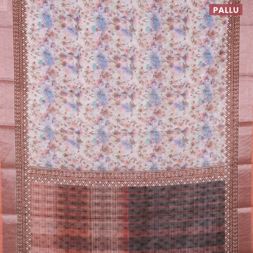 Linen cotton saree off white and rust shade with allover floral prints and silver zari woven border