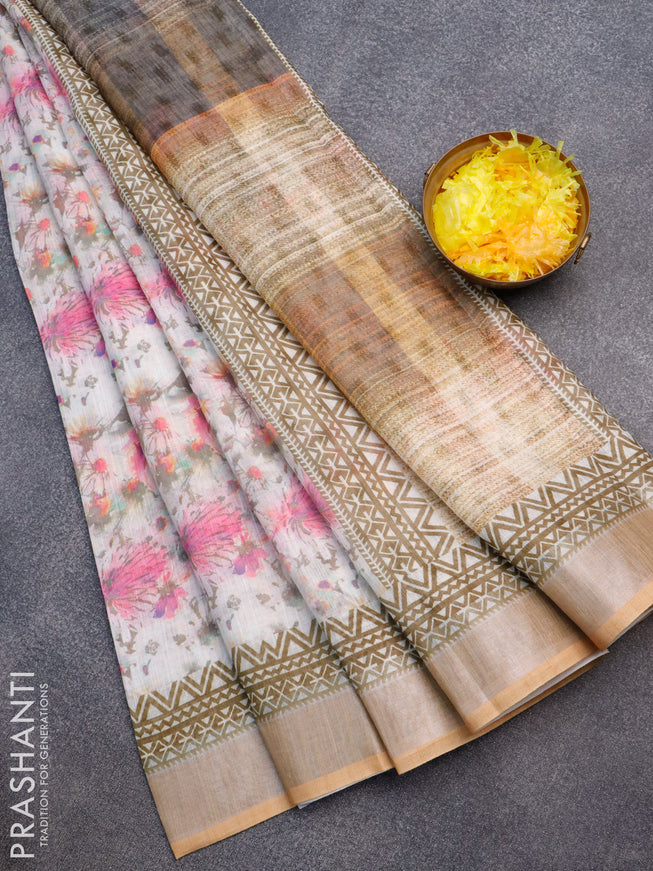 Linen cotton saree off white and mustard shade with allover floral prints and silver zari woven border