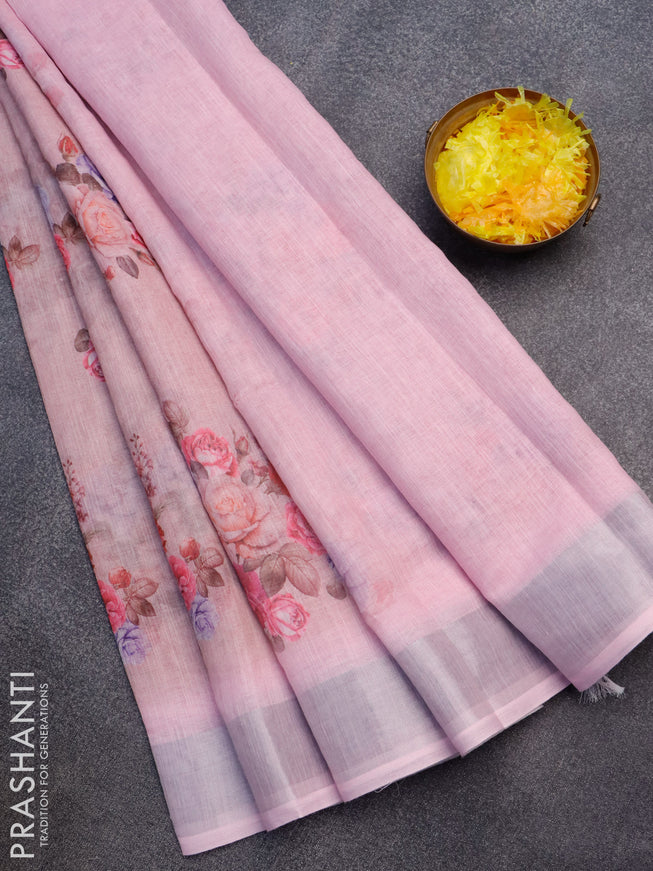 Linen cotton saree pastel pink and light pink with allover floral butta prints and silver zari woven border