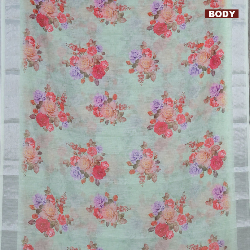 Linen cotton saree teal shade with allover floral butta prints and silver zari woven border